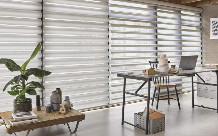 White Luxaflex® blinds in office